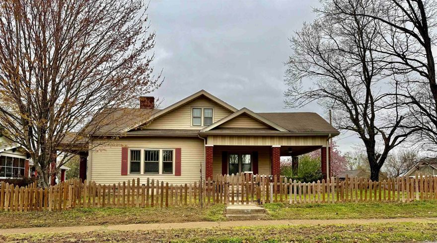 Bring your vision to this historic 1923 residence! Brimming with timeless charm, this home features original hardwood floors, generous room sizes, and a versatile layout. The flexible floor plan includes a downstairs bedroom perfect for a den or flex space, plus an additional detached room in the backyard that is ideal for an office, studio or guest room. The upstairs has built-ins, closets, a bathroom and a window seat. This home is a great opportunity for renovators looking to restore a classic property to its full potential. Being sold AS-IS; HVAC is currently inoperable and will require replacement. This home will not qualify for FHA, VA or RD. Conventional or Cash only.