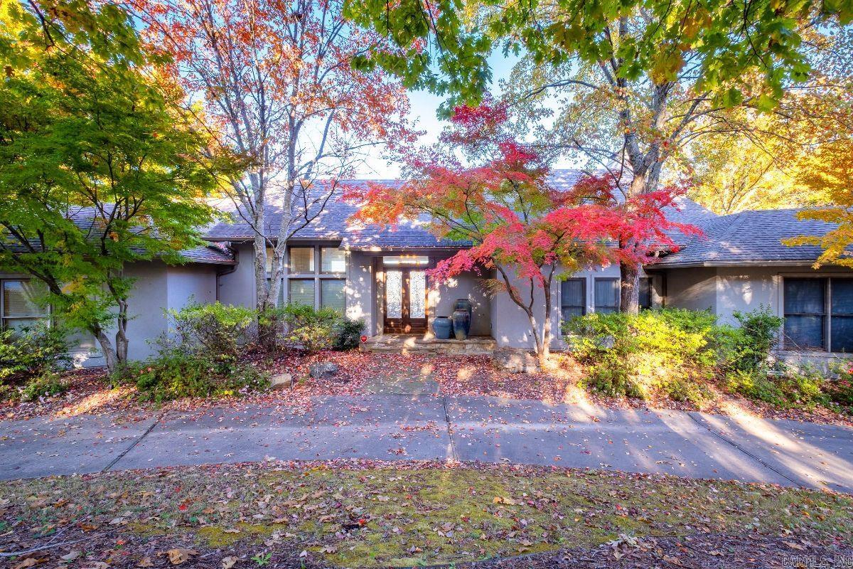 Beautiful one of a kind home a on a private street offering 8.23 acres. This amazing house overlooks the Arkansas River with stunning views! The open floor plan offers wonderful spaces for formal/informal entertaining. The main level has a great room, dining room, remodeled kitchen, master suite, extended deck & 4-car garage. Downstairs enjoy a game room, media room, 3 bedrooms + 2 baths & a craft room. Watch the deer from any of the decks. Private living within the city. Come see!