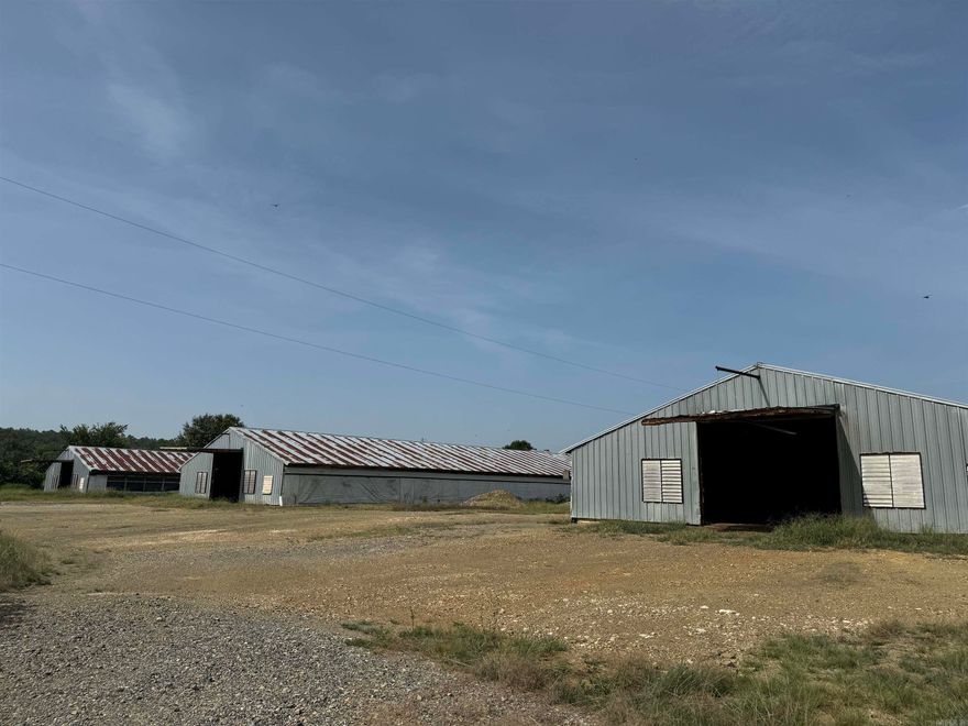 Looking for storage? We've got you covered! Available April 2024, 4- 40x350 retiring chicken houses sitting on 7.49 Acres. Also includes a 25x35 metal storage building on a concrete pad, 18x36 metal canopy for camper storage, a 75KW Deutz New Ag generator, 2 wells are located on the property. Beautiful panoramic view and within minutes of Lake Ouachita.