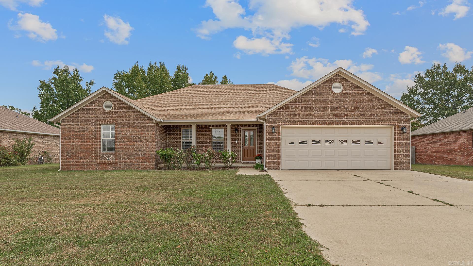 Immaculate One-Owner Home with Room to Spread Out. This meticulously maintained home features a spacious open floor plan, 3 large bedrooms (including 2 primary suites with walk-in closets), and 2 full bathrooms. Enjoy fresh paint throughout, even in the garage, plus stainless steel appliances, gorgeous kitchen cabinets, and the refrigerator stays! Enjoy a welcoming front porch accented with rose bushes, and step out back to a fully fenced yard with a concrete patio, newer wood privacy fence with durable metal posts. Plus, a newer roof provides added peace of mind. Don’t miss this rare find — move-in ready and full of charm! Professional pictures coming soon!