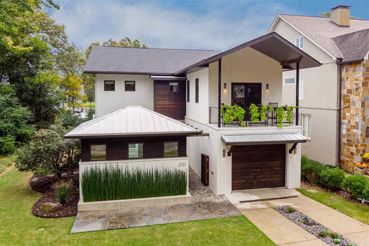 Urban chic in the Heights! Featured in Modern Farmhouse mag spring 2018. This 5bdrom 4.5bath is a warm contemporary home w/ exposed brick inside, antique hand hewn beams, concrete, tile & wood floors, Carrera marble & stainless counters in kitchen. WB fireplace inside & outside on covered patio. 2 car tandem garage. Fabulous indoor & outdoor living which is perfect for entertaining + detached office ideal for privacy. Many areas of unique storage and too many extras to list! SEE AGENT REMARKS.