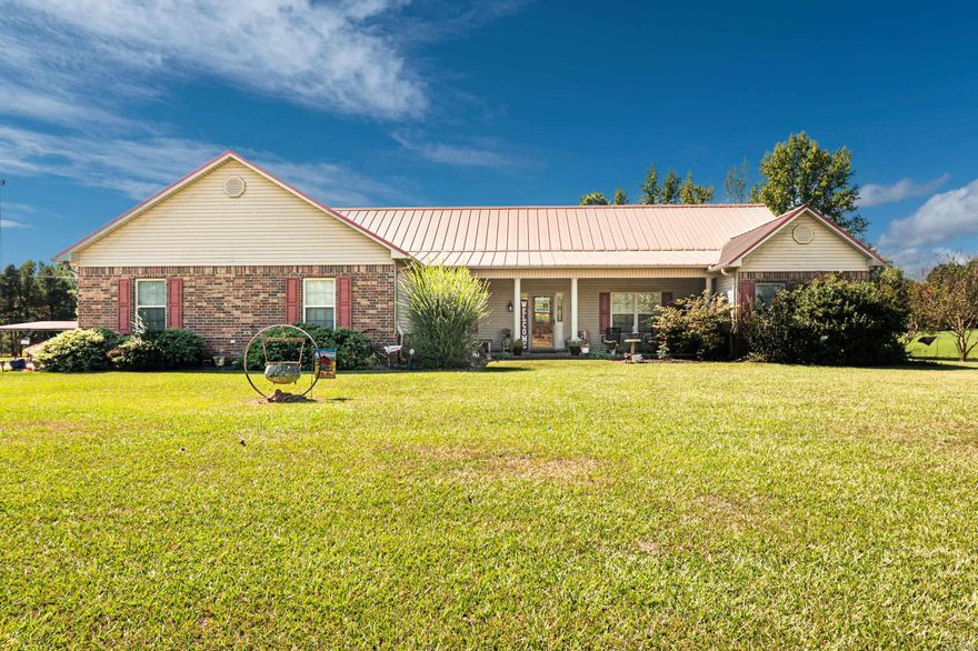 Discover quiet country living in this spacious 3-bedroom, 2.5-bath home on 6 acres. With 2,568 sq ft of living space, an oversized garage, and a durable metal roof, this property offers comfort, functionality, and plenty of room to roam.  Located just a short drive from Rison town center and within commuting distance to Pine Bluff, this property offers the best of both worlds—seclusion and convenience.