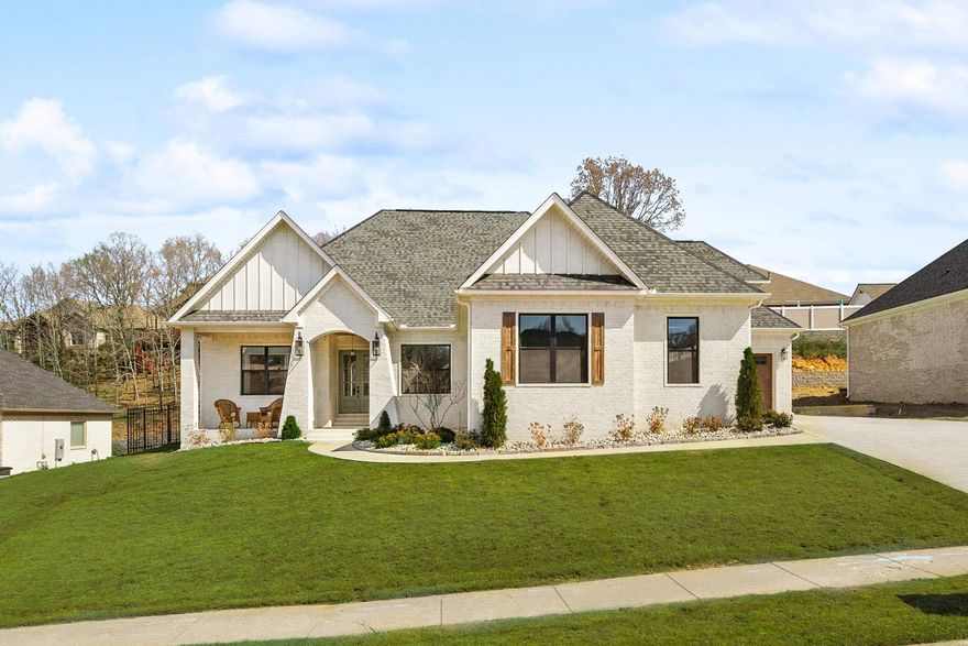 This home checks all the boxes with a smart split-bedroom floor plan, beautiful custom finishes, and thoughtful upgrades throughout. Offering spacious bedrooms, huge windows, natural light, and 8-foot doors that add to the open, upscale feel. Cozy office w/ built-in storage, while the large living room is anchored by a gorgeous ventless gas brick fireplace and bonus space upstairs leaves little to be desired. The designer kitchen is a standout with custom cabinetry, a coffee bar with mini fridge, sparkling dolomite marble countertops, a spacious walk-in pantry, and a butler’s pantry featuring leathered granite countertops. The primary suite is a true retreat with soaking tub, and laundry room access with utility sink conveniently connected to the suite. You’ll also love the mudroom entry with custom lockers, custom cabinetry throughout, durable stone polymer composite and tile flooring, and an upstairs bedroom with its own private full bath. Outside, the oversized 3-car garage, walk-in attic with floored storage, and recent improvements make this one even more special. Since purchase, many upgrades, some include natural stone landscape, sprinkler system, steel fencing and more!