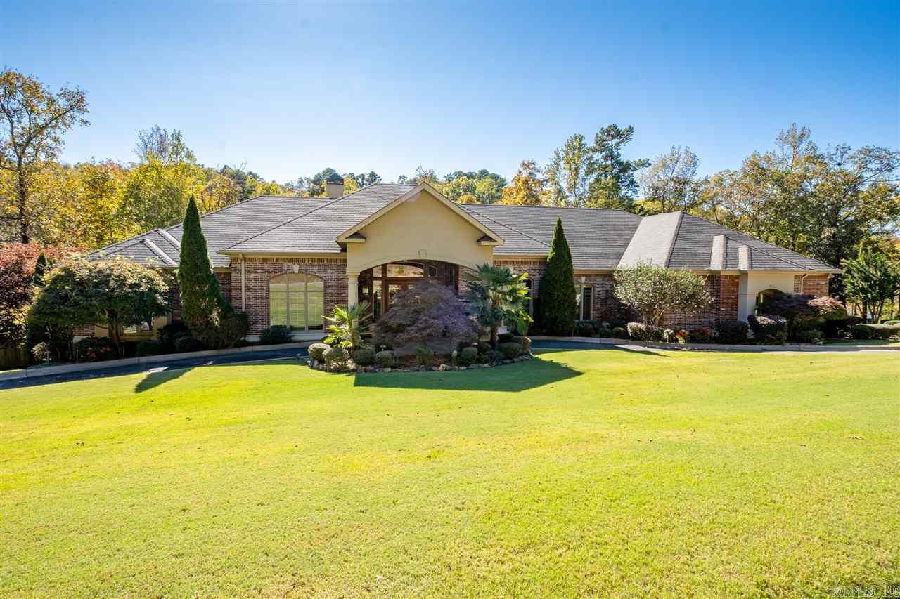 Awesome one level open concept home backing to beautiful pond with abundant landscaping. Gorgeous floors & exceptional details thru-out makes this home the perfect retreat! Formal dining, living/office, impressive great room w/FP, luxurious master suite w/spa bath apart from 3 guest ensuites + lrg saferoom. Fabulous eat-in kitchen w/top of the line SS appl. 2-2car garages w/staircase to bonus/storage rm (not in SF) Covered patio overlooking beautiful pool & hot tub + cabana w/bath under house. Come See!