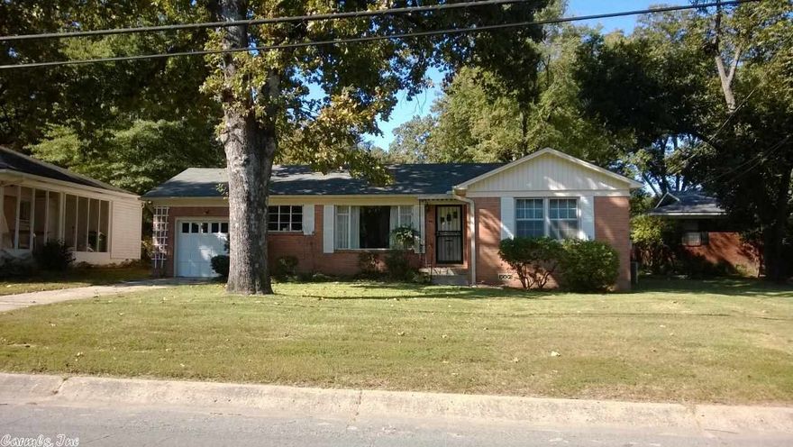 Location!! Location!! Location!! Don't miss this one. Located across from Park and Lake. Lovely lake view. Brick and siding single level in very nice condition. New roof. 3 bedrooms with 2 full baths. Living room, dining room plus breakfast room. Large master with 2 walk in closets. Superb level backyard with shop and patio. This one is a must see in North Little Rock's Park Hill Addition.