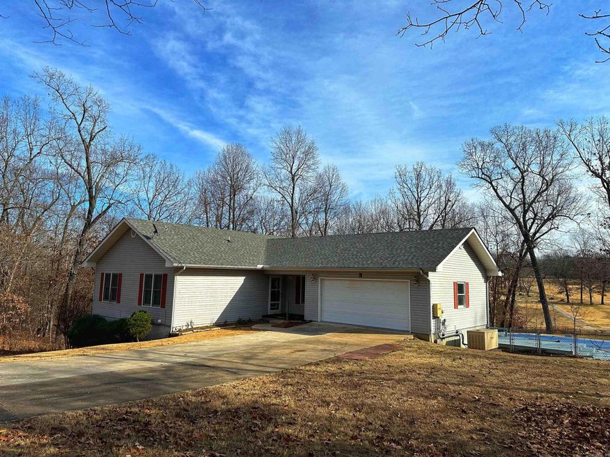 Ready, set, go! Get in your cart in the attached cart room and head straight for the greens from this home located on the Cherokee Village South Course! This well maintained & spacious 4 bedroom, 3 bathroom home leaves little to be desired with plenty of room for both living and play and a touch of privacy with there only being 2 homes on the road! 2 bedrooms and 2 bathrooms are located on the main level and downstairs you will find 2 bedrooms, 1 bathroom, and a man cave that will impress, complete with bar and pool table! Step out of the man cave into the fully enclosed cart room for a day of golfing! The in ground pool will be waiting on you for an afternoon of lounging and grilling! Refrigerator and pool table convey and the home has a whole house generator as some added perks!