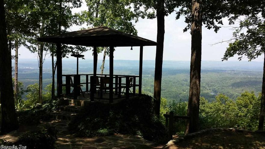 Million Dollar View is what you get with this charming country home sitting on a bluff over looking the scenic Heber Springs valley that includes views of the Little Red River and Sugar Loaf Mtn. Gazebo, entertaining patio, 30x40 Shop, Stocked Pond w/dock and 24x34 barn, all sitting on 5.90 acres and additional 5 acres available that adjoins this property with the same amazing view. Home is ready for your personal touch, large kitchen with lots of cabinets.  Storm Cellar and long window lined bonus room.