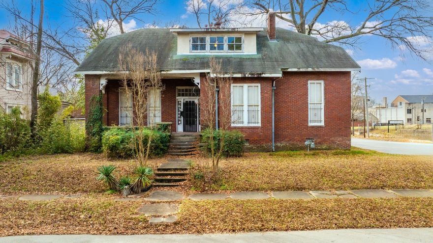 Built in the 1920s and located in the heart of downtown Little Rock, this historic home is beaming with original charm and character that simply cannot be replicated. From its classic architecture to its timeless details, this property offers a rare opportunity for restoration and redevelopment in one of the city’s most sought-after urban locations. The home features five bedrooms, with three located on the upper level and two on the lower level, providing a flexible layout with significant upside. Situated on a desirable corner lot, the property includes off-street parking—an exceptional advantage for downtown living. Just a short walk to the vibrant SoMa district and the popular Root Café, this home is ideally positioned for someone looking to bring new life to a true downtown gem.