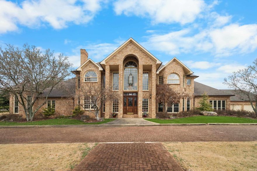 Extraordinary 7,628 sq. ft. estate on 7.1 level acres in Hot Springs offering luxury, versatility, and endless potential. The main home features 4 estate-sized bedrooms, 5.5 baths, soaring 25’ ceilings, and dramatic walls of windows that fill the expansive living spaces with natural light. A beautifully landscaped swimming pool creates a private resort-style retreat.  Additional highlights include a 4-car garage with a small upstairs apartment, a 30x70 shop with solar panels to offset electricity costs, and a detached guest house for added flexibility. The property also includes a separate 2,044 sq. ft. home with 3 bedrooms and 2 baths—ideal for rental income or extended family.  With 7.1 acres of usable land, there’s room for additional homes, a barn with horses, or future development. A rare opportunity combining luxury living, income potential, and room to grow—all in one exceptional Hot Springs property.