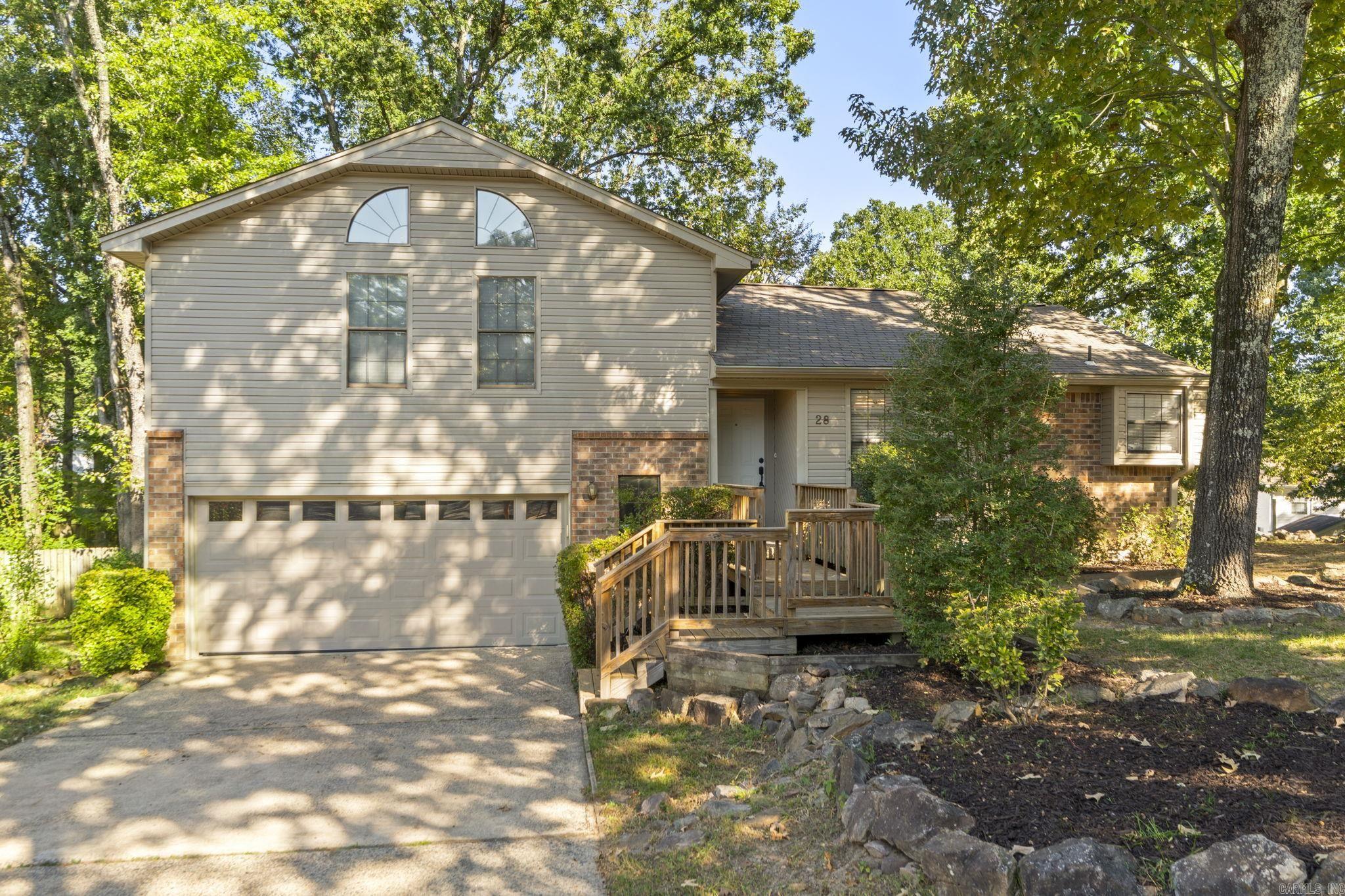 Beautifully renovated home in the heart of WLRājust minutes from premier shopping, dining, and everyday conveniences! Tucked away in a quiet cul-de-sac surrounded by mature trees, this home offers the perfect blend of comfort, privacy, and location. Inside, the open and inviting floorplan is ideal for entertaining or relaxing at home. A cozy breakfast nook and charming gas fireplace create the perfect setting for morning coffee or quiet evenings in. Large, thoughtfully placed windows fill the home with natural light and highlight the fresh, modern updates throughout. The spacious primary suite offers a peaceful retreat with a walk-in closet and private ensuite bath. Two additional bedrooms provide generous space for guests, or a comfortable home office. Step outside to a large back deck overlooking a fenced backyardāperfect for outdoor dining, play, or summer get-togethers. Updates include fresh interior paint, upgraded cabinetry, new luxury vinyl plank flooring, modern cabinet hardware, new window treatments, a brand-new furnace, new ceiling fans, enhanced crawlspace insulation, and a new wood privacy fence. The oversized two-car garage offers easy access! This one has it all!