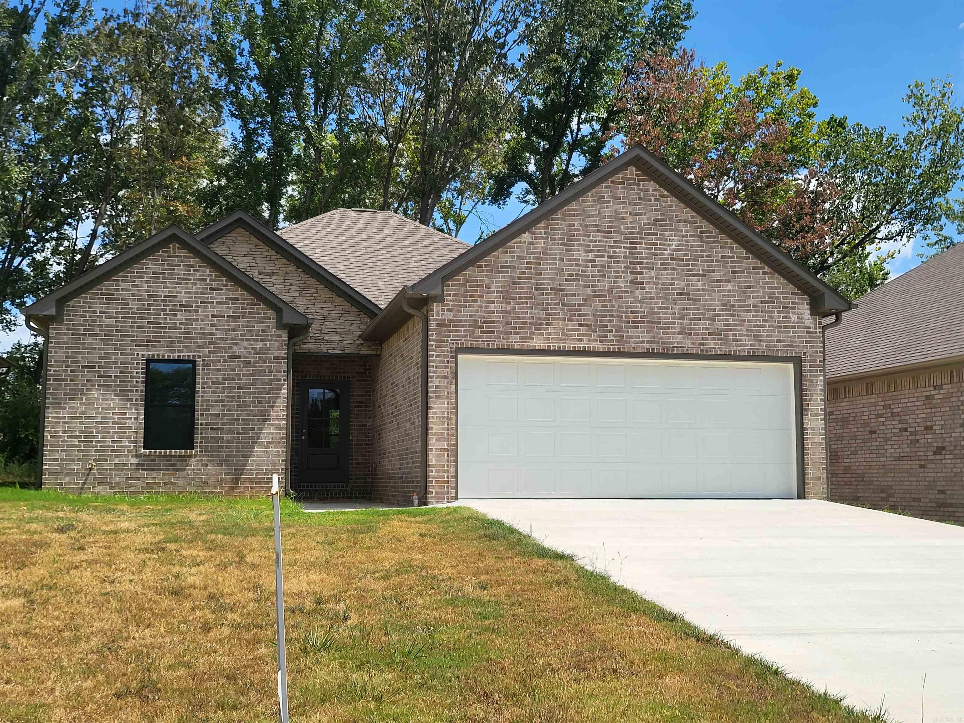 Welcome to 929 N Jeff Davis Ave, Jacksonville, AR ā a brand-new construction home perfectly situated near the Little Rock Air Force Base and just minutes from interstate access for an easy commute to Little Rock and surrounding areas. This beautifully designed home blends modern style with upscale finishes, making it one of the best new homes for sale in Jacksonville. Step inside to a bright and spacious living room highlighted by a custom blond/natural wood vaulted ceiling that creates the perfect balance of warmth and elegance. The chef-inspired kitchen offers extra-tall, all-wood cabinetry, solid surface countertops, custom tile backsplash, and designer lighting, along with a generous dining area thatās ideal for gatherings. With 9-ft ceilings, abundant natural light, and an open layout, this home feels both expansive and inviting. The primary suite is a true retreat featuring a spa-like bathroom with a walk-in tiled shower and high-end finishes. If youāve been searching for a new home in Jacksonville, AR near LRAFB, this property checks every box. Donāt miss your opportunityāschedule a private tour today!