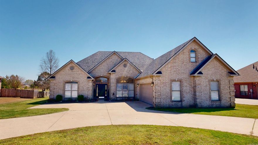 Escape the Cookie-Cutter — Discover Space, Style, and Your Own Private Oasis  This custom-built MOVE IN READY home offers the space, character, and comfort you've been searching for.  Designed for both everyday living and entertaining, the home features 4 spacious bedrooms on the main level plus a large upstairs bonus room with its own half bath—perfect for a media room, game room, home office, or private retreat.  The luxurious primary suite is a true sanctuary, complete with a spa-like bathroom featuring a relaxing rain shower, soaking spa tub, and separate his-and-hers walk-in closets, giving you both comfort and convenience.  Step outside to appreciate the beautiful brick exterior, an oversized garage that adds both functionality and impressive curb appeal, and a circular driveway that provides plenty of parking for family and guests. And just wait until you see the special surprise inside the garage—a feature that makes this home even more unique.  This home truly has it all: elegance, space, tranquility, and thoughtful design—the perfect place to relax, entertain, and enjoy the lifestyle you deserve. ENJOY THE 3D TOUR HERE: https://my.matterport.com/show/?m=cBrfQm7hs6v&mls=1