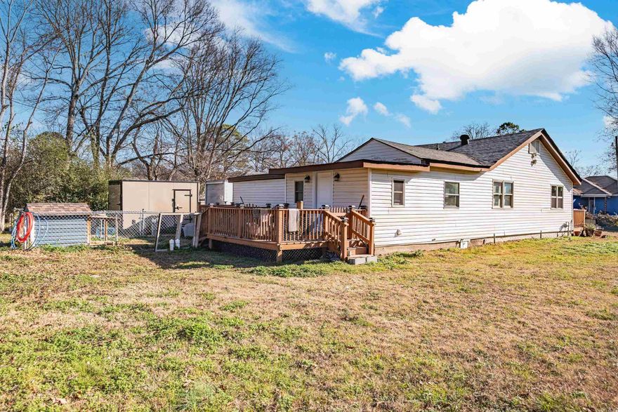 Home is spacious and was updated in 2023; home has extra bonus room can possibly be used as another bedroom; partially fenced; Ez show must call agent; there will be 2 small dogs in back yard; this property has adjoining lot that can be purchased separately;  comes with deck and front porch Gated for privacy.