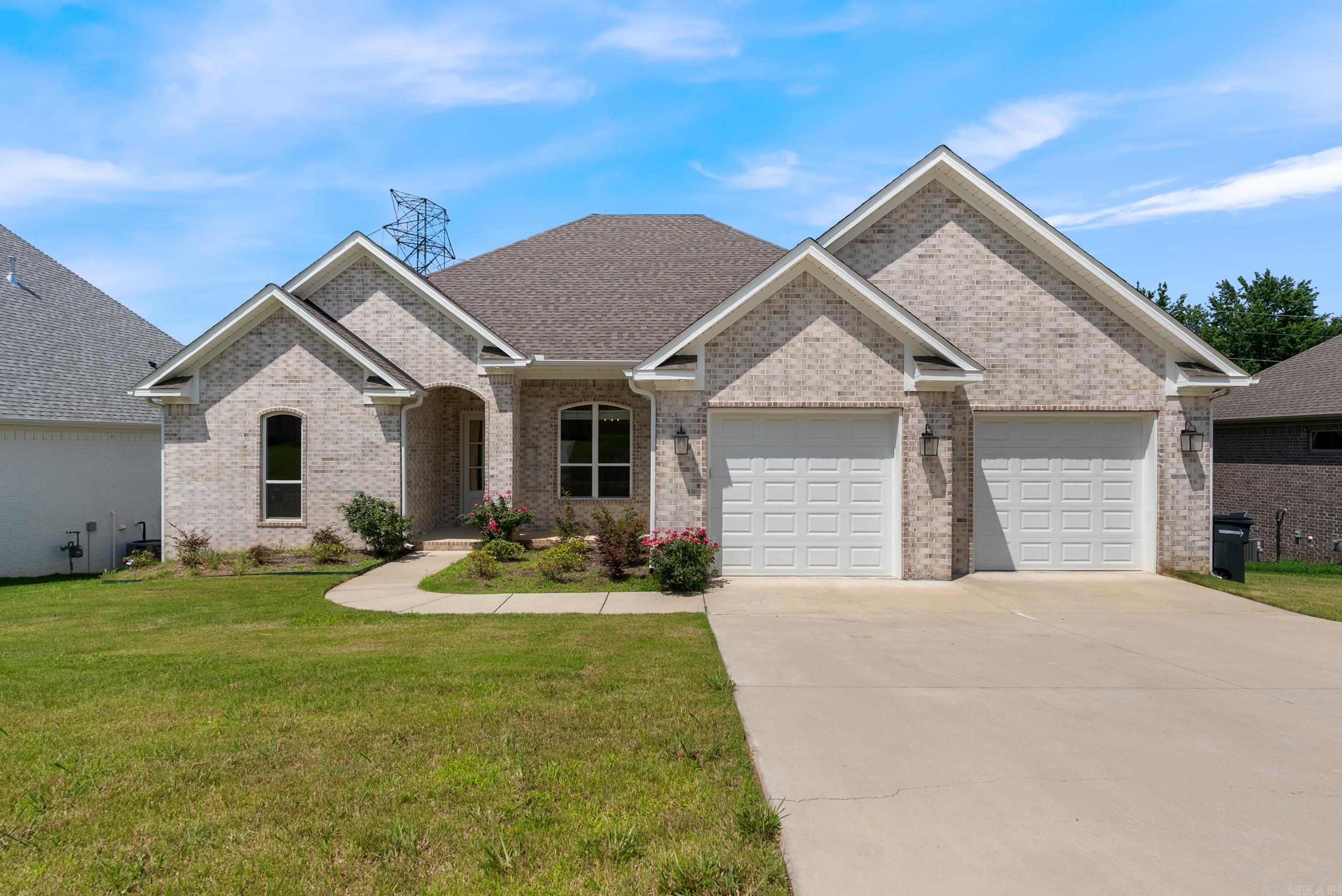 Stunning home with 4 bedrooms and 3 full bathrooms, which is very hard to find. Open concept living area with cozy fireplace. The home is set up perfectly for entertaining. Large kitchen island that is open to the living room. Separate dining room that could also be used as an office or play room. Breakfast area off of the kitchen. Beautiful backsplash and stainless steel appliances. The primary suite is separate from the other bedrooms, creating a sense of privacy. Custom tile shower in the primary bathroom and a soaking tub. 3 bedrooms on the other side of the home with 2 bathrooms. Outside you'll find a covered deck that provides shade from the evening sun. The deck is perfect for grilling and hanging out with friends and family. A walk-in storage area in the crawl space provides storage for lawn equipment, bikes, and toys. The home is energy efficient and boasts a tankless water heater. Great location with easy access to the Little Rock Air Force Base, shopping, restaurants, and schools.