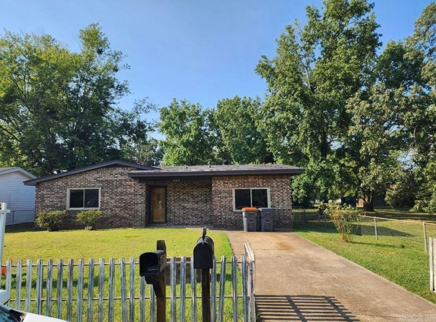 Looking for an affordable home in town with a detached shop in the backyard?! Welcome to 1002 E F Street – a beautifully remodeled home in the heart of Russellville. This charming property features fresh paint, updated flooring, and a stylish, open kitchen. The bathrooms have been renovated with modern finishes, and the flexible layout offers 3 bedrooms and 2 living areas. Enjoy a spacious, level backyard, perfect for pets or entertaining, and a lovely back patio for relaxing evenings. Located just 5 minutes from downtown, parks, and Arkansas Tech University, this home is both convenient and move-in ready. Don’t miss your chance to own this gem!