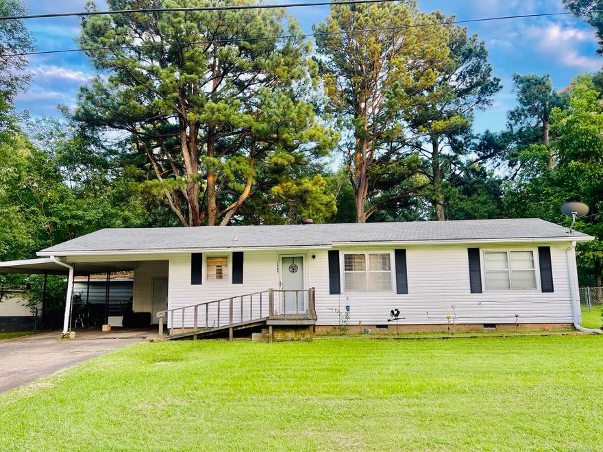 Do not miss out on this well maintained 3-bedroom, 2-full bath home seating on .31 acres. With a newer hot water heater less than 3 years old. The HVAC system was replaced around 4 years ago, new plumbing pipes under half of the house, newly painted kitchen, and recently leveled. Large sized backyard that's fenced in, with two storage sheds. Handicap accessible entrance, with two-car covered parking. The refrigerator conveys with reasonable offer. Home is being sold As-Is. Seller is motivated!