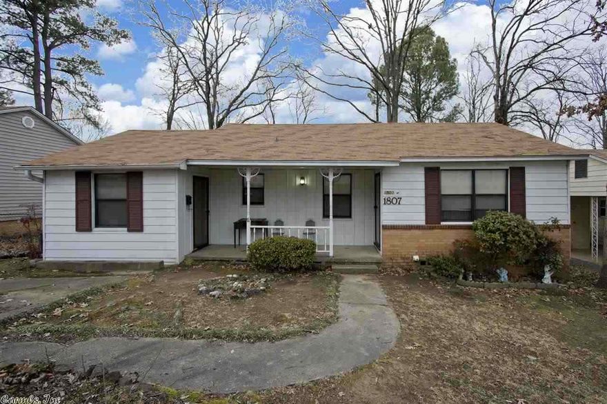 Charming, 2 bedroom/1 bath, ONE-OWNER home!  This darling house sits on a quiet street and has original hardwood floors that have been preserved underneath carpet. Brand new roof put on in spring 2014.  Fully fenced backyard with storage building.  Carpet steamed clean!  Measurement approximate.  Please measure.
