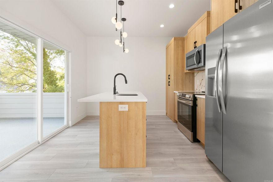 This stunning second-floor apartment in the heart of SOMA is brand new and ready for you! Get ready to be wowed by sleek quartz countertops in the kitchen and bathrooms, stainless steel appliances, and an in-unit washer and dryer for ultimate convenience. But wait, there's more! This apartment boasts a private 1-car garage and additional off-street parking, a rare find in downtown. Plus, unwind and take in the city views from your own private, large rooftop patio – perfect for entertaining friends or enjoying a cup of coffee under the morning sky!