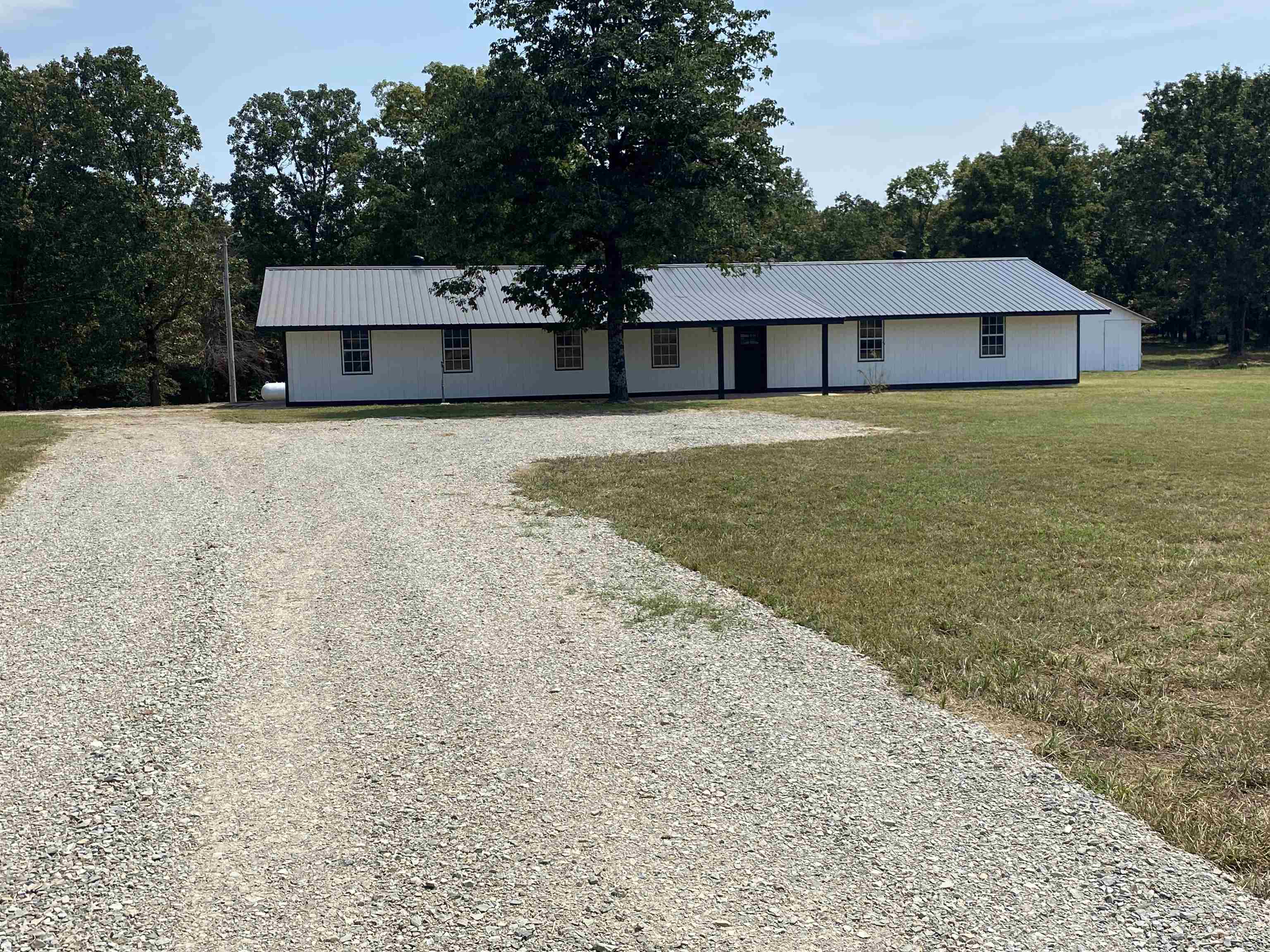 Beautiful 2460 sq ft modern, open concept home sitting on 8.3 m/l acres! Half cleared, level land and half woods. Home has 4 bedrooms, 2 1/2 baths. Laundry room has half bath with mudroom. The kitchen features all new stainless steel appliances, custom hand poured kitchen counter tops, large pantry and opens to the dining room. Dreamy master bathroom has a soaking tub, walk in shower and large walk in closet. New roof and HVAC installed in 2025. Small pond on the back of the property and a storage building Enjoy watching deer out your kitchen windows! Call today for a showing!!