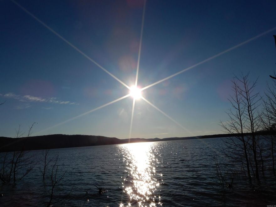 THIS LOT OFFERS ABSOLUTELY THE MOST BREATH TAKING VIEWS OF GREERS FERRY LAKE!!! Enjoy the LAKE activities during the day and in the evening relax with gorgeous SUNSET VIEWS.  Be a part of Greers Ferry Lake's premier Subdivisions only 5 minutes from Shiloh Marina. Drive through the gates of SHILOH LANDING SUBDIVISION today and take a walk to see for yourself the beauty of  LOT 22 SHILOH LANDING. Nature trail, pavilion is being built now with picnic tables, swing set and fire pit to be completed by developer. Make your LAKE HOUSE DREAM COME TRUE TODAY!!