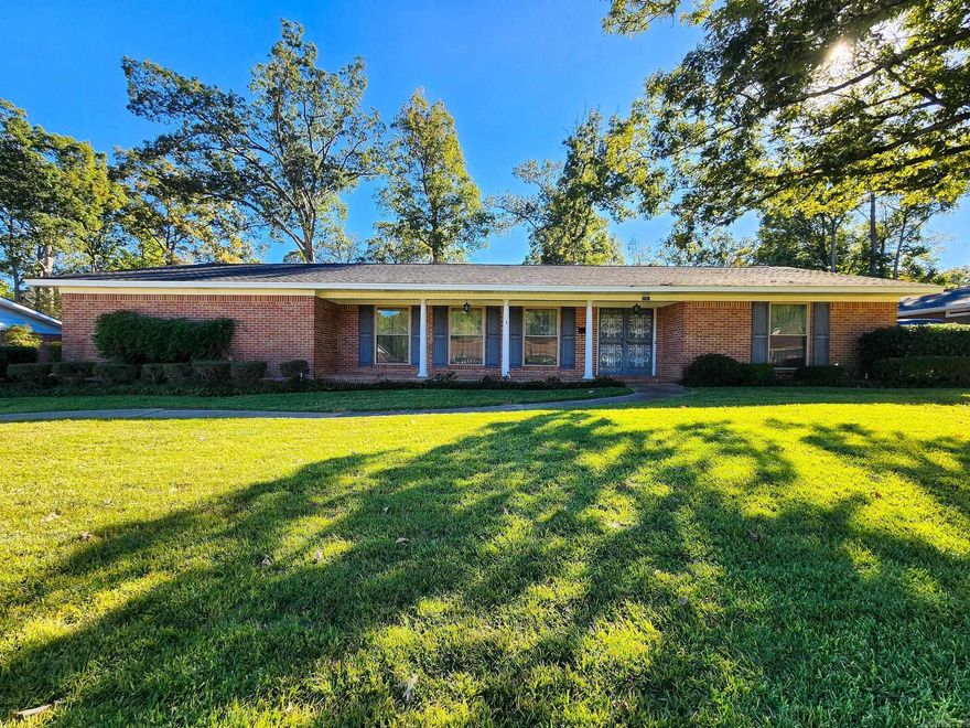 Charming 3-bedroom, 3-bath brick home located in the desirable Thompson Heights neighborhood. This spacious property features a cozy gas log fireplace, electric cooktop, and double oven. Enjoy comfort year-round with two central heat and air units and the peace of mind of a whole-house generator. The home also offers a large office and additional bathroom in the add-on area—perfect for remote work or guests. Outdoor living is made easy with a brick patio and partially fenced yard.