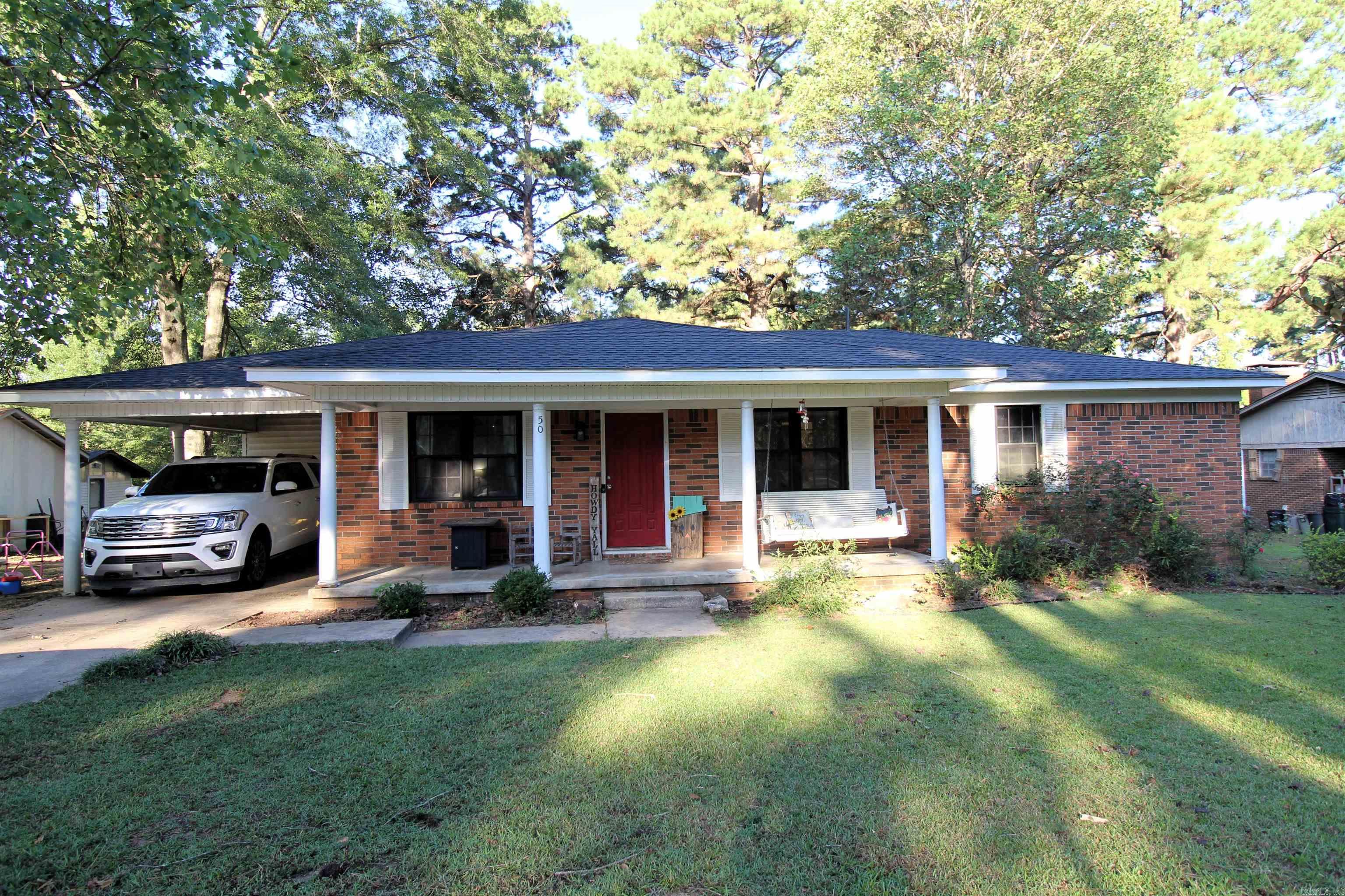 The perfect home for your precious family on 2 city lots!*gorgeous (original) hardwood floors that were just re-refinished*roof on house and shop new in 2023*large living room*nice kitchen with new countertops*huge walk-in closet in master bedrooms*full brick*two shops-one shop is 20x30 and the other shop is 16x24*large chain-link fenced backyard*this home was remolded in 2023 and is move in ready*