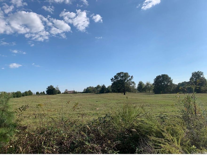 If you are wanting to build your dream home then you have found the perfect spot.  Paved road with a corner 5 acres, pasture with small pond.  Mostly fenced.  Be in Searcy in about 15 minutes and Rosebud in 10 minutes.  Great location with nice farms in the area.  Perfect for horses, etc...no restrictions.  Mobile homes are allowed