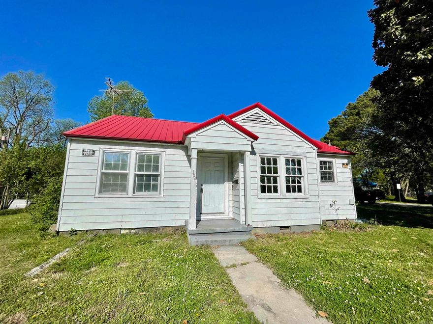Don't miss this investment opportunity in 304 Plaza Ave. Trumann, AR 72472. This 2 bedroom, 1 bath home has original hardwood floors, metal siding, and a metal roof keeping maintenance at a minimum. There is a window air unit and a spot for a gas heater to be installed. Situated on a nice corner lot with parking available. Call your favorite REALTOR® with questions and to take a look.