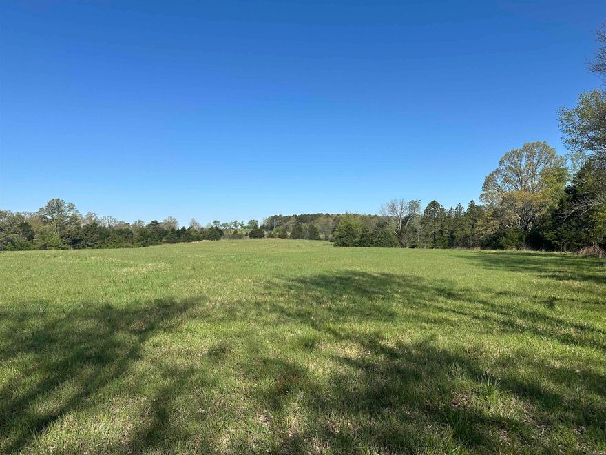 One of a kind rural property consist of beautiful 26 acres  + or - with mostly level pasture land that's secluded in the foothills of the Ozark Mountains with wet weather creek the through woods and there's more woods on the bluff line that would be a great building site to just step into your backyard providing you with a great patio spot to sit out and drink coffee and see a great view across the hills down towards valley country and this property is surrounded by larger wildlife parcels not to mention the abundance of deer and turkey that already forge here and you may even catch a glimpse of a black bear. I like that the rural Hwy 310 is not a major traffic flow road so it's quiet enjoyment place to live and would make a great hobby farm for few horses and cows. If you want though it's not far to all the amenities of Searcy AR or slide over to small town Rosebud and Greers Ferry lake at Heber Springs makes this place location location location .