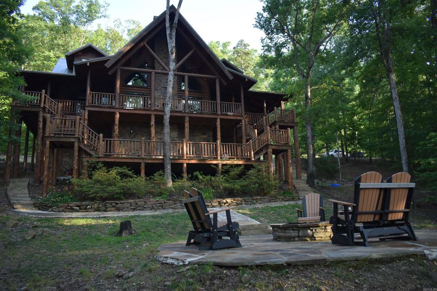 2750 Sq. Ft. Log Home • 2000 Sq. Ft of Porches and Decks • Vaulted Ceilings with Extra Large Log Beams • Rock Fireplace with Black Walnut Mantle • 3 Bed 3.5 Bath • Plenty of Room for entertainment • Conversation Pieces in every room • Large Utility Room • Three Clawfoot Bathtubs • Gas Log Fireplace in Master Suite • Three levels of Decks and Porches • Two back decks with a Mountain View • Stone walkway to custom rock firepit in back yard • Fenced in Back Yard • Generator for Automatic Power Backup • 110 +/- acres of Beautiful Fields and Extraordinary Pine and White Oak Timber • Over ¾ of a mile of Ouachita National Forest Boundary • Two Ponds • Abundance of Deer and Turkey • Two Fenced Pastures • Open Span Barn with Horse Stalls • Highway 80 Frontage • Fiberoptic Internet
