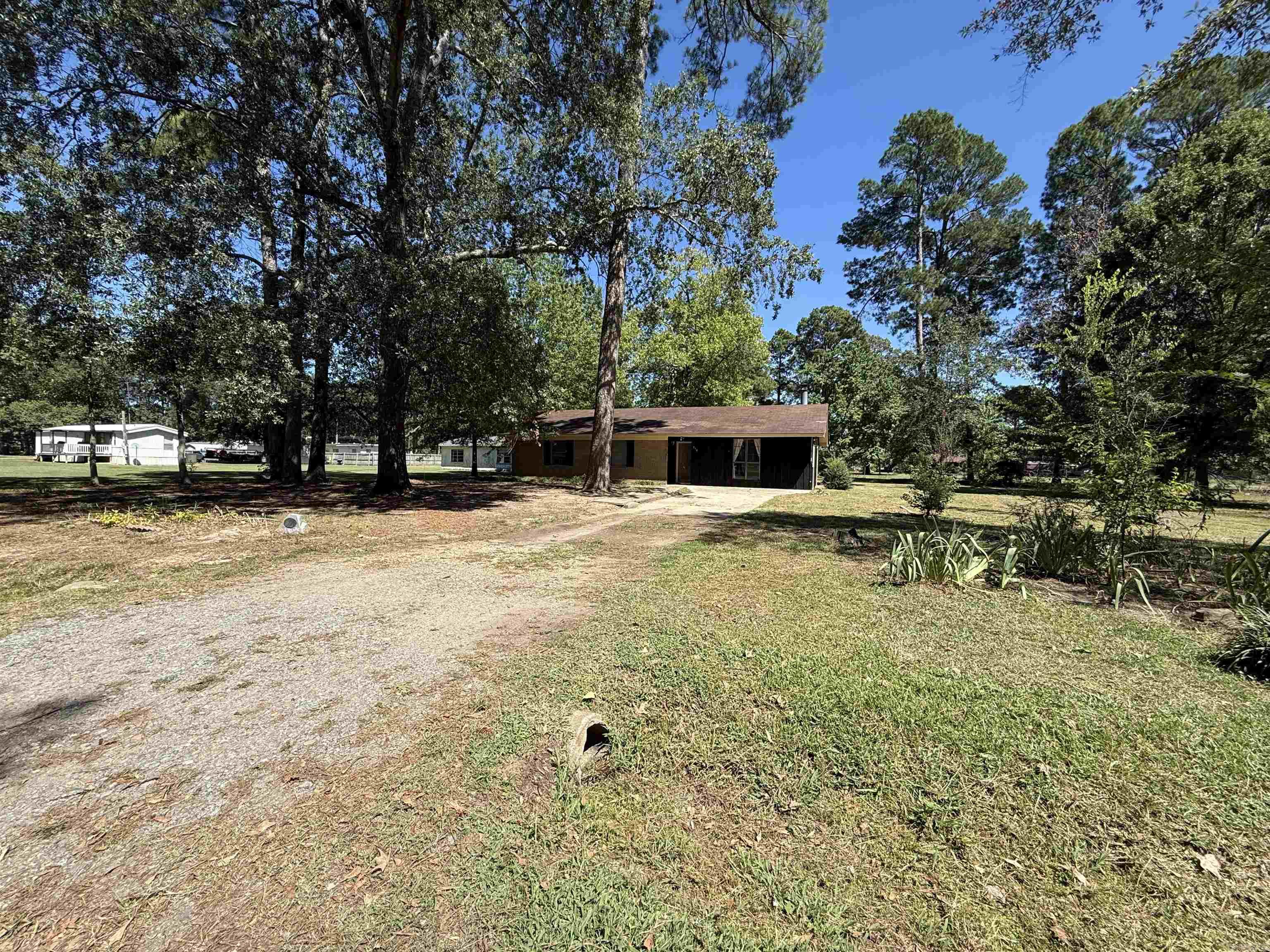 Cute starter home or downsizer located on a corner lot. Large windows in the spacious living room bring in extra natural light. Open to the dining area it is a great place to mingle with guest and family. A spacious double lot yard gives you the perfect opportunity to add whatever you need. Don't miss out on a great starter home located in Bearden!