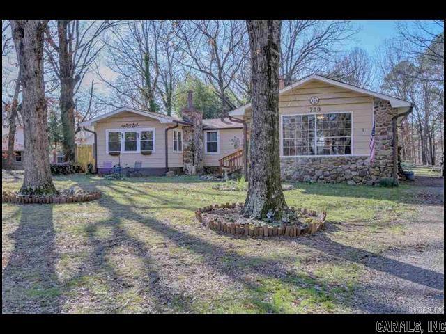 *LITTLE ROCK* NICE HOME IN PARKWAY NEIGHBORHOOD!! Country Charm Meets City Convenience! Tucked Away On 0.64 Acres Of Wooded Serenity, This Beautifully Remodeled 4 Bedroom And 2.5 Bath Home Offers The Perfect Blend Of Privacy And Modern Comfort. Recently Renovated! Interior Features Updated Kitchen And Baths With Granite Countertops! Newer Appliances, Flooring, Paint, Lights, Doors, HVAC, Roof, And More! Enjoy Two Spacious Living Areas, Including A Cozy Living Room With Stunning Wood-burning Fireplace. Master Suite Features Its Own Fireplace and Walk-In Closet. Step Outside Onto The Massive Deck Which Overlooks A Peaceful Backyard Retreat, Complete With A Koi Pond And Waterfall. Large Garden Shed/Storage Building! A Rare Find That Offers Country Living Right In The City! PET FRIENDLY!! AVAILABLE NOW!!! <a href='https://raineyrealty.com/virtualtour.php?r=ugZn1e'> Click here for a 360° Virtual Tour</a>