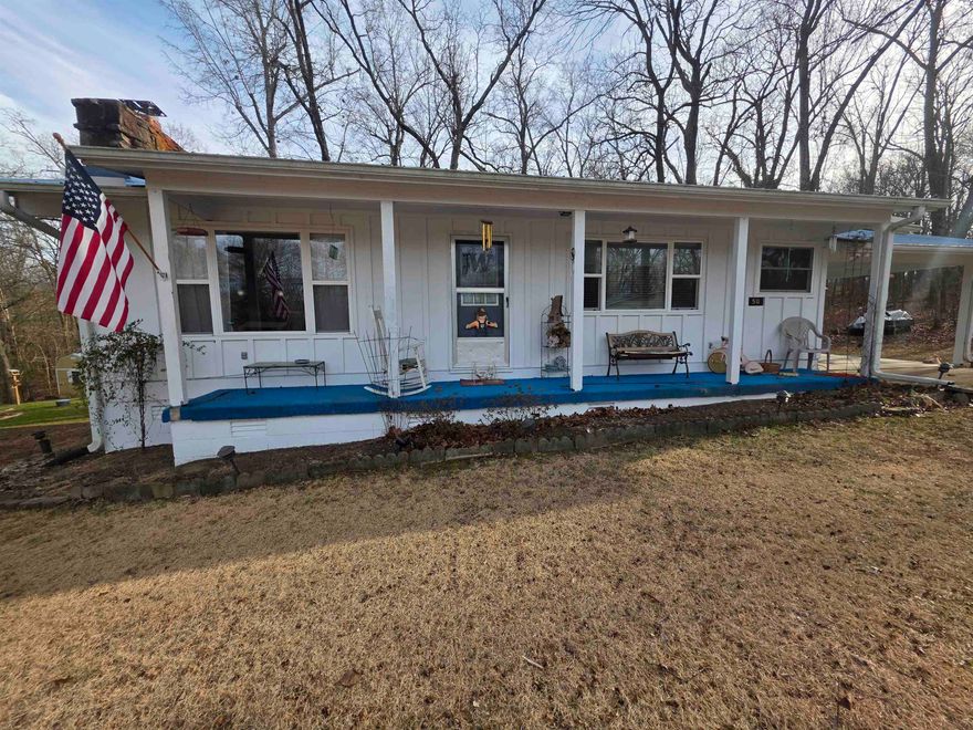 This is a must-see home with 3 bedrooms and 1 and a 1/2 baths. Great curb appeal, with a beautiful, level front yard and a large, level fenced-in backyard. Lots of landscaping and even a garden area. Carport with storage. Back deck and front porch. Fireplace presently has gas logs but can be used as a wood burner. Newer countertops and backsplash. Upgraded windows. New metal roof in 2022. New furnace in 2022. Gas back-up wall heater. Central Heat and Air. On demand water heater and water softener. Well maintained home, present owner has lived in the home for approx. 30 years. Don't forget that with ownership of this home you have access to 7 lakes, two 18-hole golf courses, The beautiful Southfork river and the rest of the Cherokee Village amenities. Schedule a showing to see this beautiful home today.