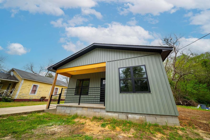 Step into this beautifully remodeled home that feels just like brand-new construction! This stunning 2-bedroom 2-bathroom property has been thoughtfully updated from top to bottom, offering modern style and peace of mind for years to come. Inside, you will find granite countertops paired with new cabinetry, creating a fresh and functional kitchen space perfect for everyday living and entertaining. Durable and stylish new vinyl plank flooring. Enjoy the efficiency of the gas tankless water heater, bright new windows, jaw dropping tiled walk-in shower in the master along with a large walk-in master closet. Front and side porches make this home even more inviting, this move-in ready home could be the icing on the cake for 2026.  Square foot measuring encouraged