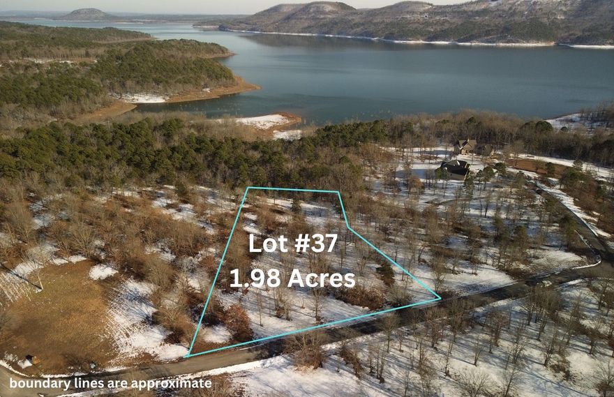 GREERS FERRY LAKEFRONT LOT Large lot in the sought-after Burnt Ridge Estates subdivision. 1.98 Acres with underground utilities and an easy walk to the water.  A boat launch is located in the neighborhood, and you are just minutes to Choctaw Marina or Fairfield Bay by water.  This lot is located between Harper's Cove on Southfork to the West and Party Cove to the East. Bring your plans, build your dream and enjoy the lake.