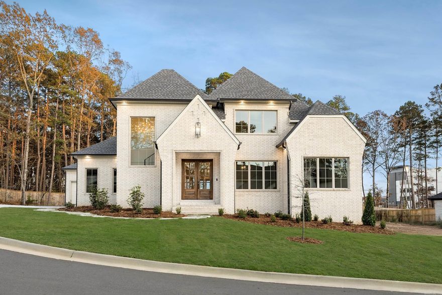 33 Mereville Place is located in one of Chenal’s newest gated golf course communities!This custom-designed 5 BR/4 BA home by Stine & Company Prime Homes offers exceptional design, luxury finishes, and a floor plan tailored for modern living.The main level features 3 spacious bedrooms, including 2 primary suites, plus a dedicated office/flex room. An open-concept layout connects the expansive living, dining, and chef’s kitchen—complete with an oversized island, gas cooktop, double ovens, walk-in pantry, and a stylish bar nook. The oversized laundry room adds both function and convenience.Enjoy seamless indoor-outdoor living with an oversized covered patio and outdoor kitchen overlooking private green space—perfect for entertaining. Situated on a cul-de-sac with green space behind and beside the home, the setting provides both privacy and serenity. A 3-car side-loading garage completes the thoughtful design.Upstairs, you’ll find 2 oversized bedrooms and a theater room, ideal for guests, family, or game nights. The backyard is pool-ready, offering even more possibilities for your dream outdoor retreat.This home is the perfect blend of luxury, comfort, and location—designed to impress!