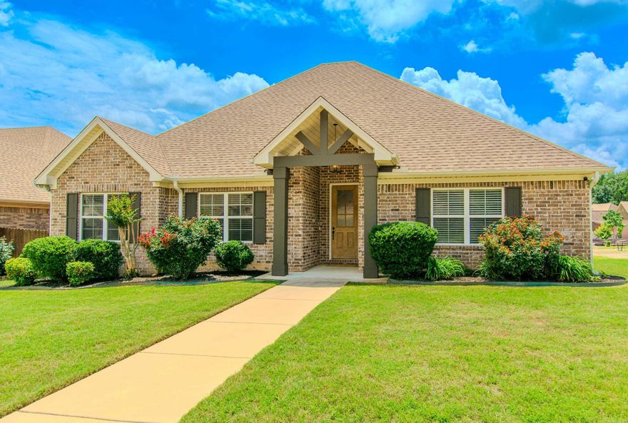 Located in one of Benton's most desirable neighborhoods, this beautifully maintained home is the perfect blend of comfort, style, and convenience. Featuring 4 bedrooms and 2 bathrooms, this home offers an open-flow layout with an abundance of oversized windows for natural light and modern farm finishes throughout. Beautiful hand-scraped hardwoods, new carpet, loads of crown molding. Granite counters in the kitchen and both bathrooms, stainless steel appliances, new smooth top range. The huge primary suite is a private retreat with spa-like bath, large tiled shower, dual sink vanity, and generous closet space. Need even more space? Don’t forget about the bonus room upstairs that can serve as a game room, an extension of your living space for a theatre room, or a private office. Laundry room is accented with a barn door, has built-in shelves, and hamper cabinets. New interior paint, Architectural shingle roof estimated around 2022, freshly mulched landscaping beds in front and back, rock landscaping, fully privacy fenced backyard with 3 gate entrances-2 single and 1 double, and covered back patio. What more could you ask for in perfect outdoor living space. Please see Agent Remarks.