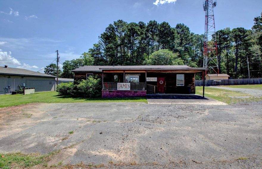 Located on highly visible Reynolds Road in Bryant, this versatile commercial property offers endless potential! With 1,248 square feet of space, the stand-alone building features four separate office areas, a welcoming reception area, a bathroom, and a kitchen. Currently operating as a salon, it’s perfectly suited for continued use in the beauty industry or easily adaptable for office space. Situated on a 0.34-acre lot directly across from Bryant High School, this prime location ensures excellent traffic and accessibility. Whether you’re looking to expand your business or start something new, this property is a fantastic opportunity. Don’t miss out—schedule your showing today!