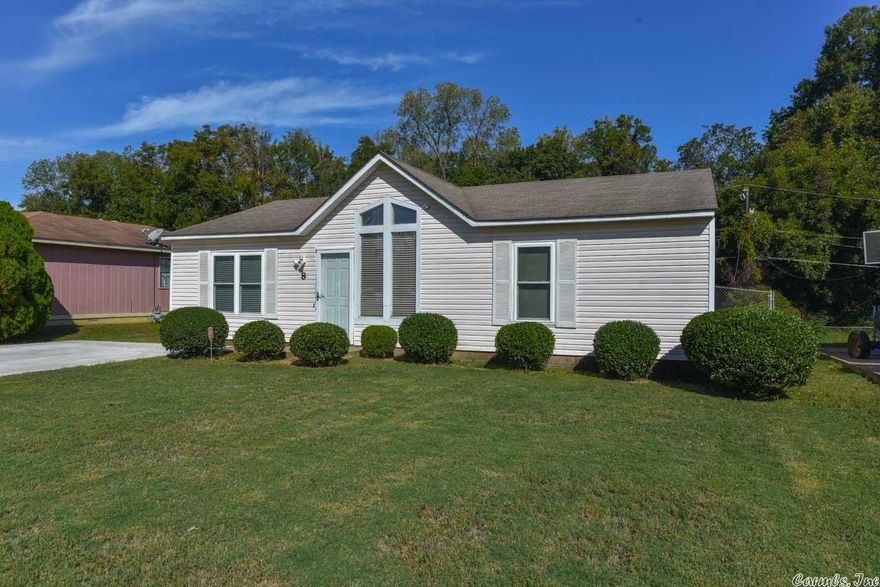 Charmin Home 1040 Sq. Ft 3 br 2 ba prefect Starter home close to school, shopping and business. Large back yard  great for entertaining lots of updates.