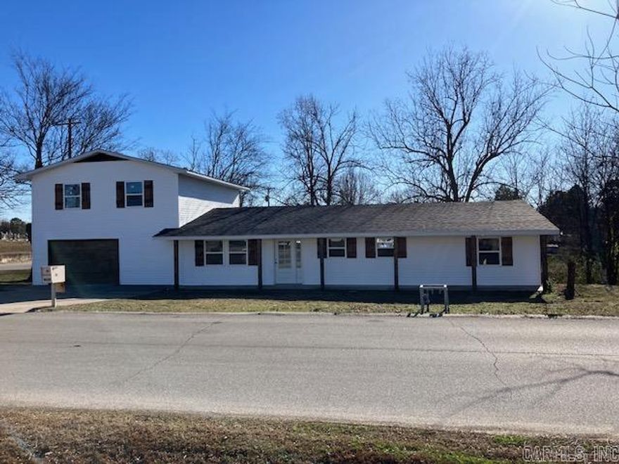 This beautifully remodeled home has been completely updated. The home offers a large master suite on both the main level and upstairs and an open inviting floor plan that you are sure to love. Downstairs contains 3 total bedrooms and 2 full bathrooms. Upstairs contains one very large bedroom/bathroom suite complete with two large walk-in closets. All bathrooms have tiled shower walls and nice fixtures and both master suites have dual vanities. New roof, siding, windows, HVAC, floors, drywall, electric, kitchen and bathrooms and more. A garage and large side yard complete the package with this one.   This house is priced to move. An incredible value for the cost.