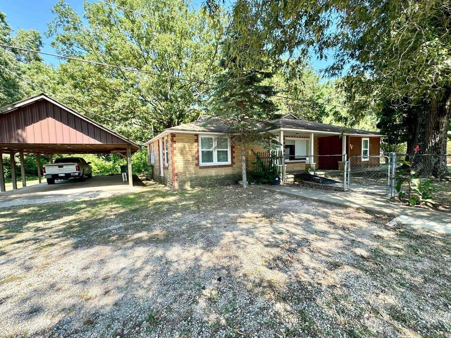 2 bedroom/2 bath home with large utility room close to town and close to White River as well as the National Forest. Home has an open floor plan with spacious bedrooms being separate. Extra-large detached carport, nice private back yard. Would make a great starter home, vacation or rental!