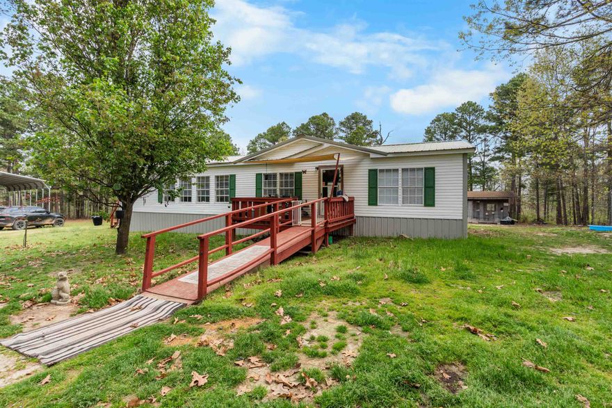 Check out this 2005 double wide on approximately 15 acres just a short drive from Oxford, AR. This 3 bed, 2 bath home offers comfortable living with handicap accessibility and several key updates, including a new roof and flooring in 2023, along with a new HVAC system installed in March 2023.  The land provides a great mix of open space and privacy, perfect for anyone looking to enjoy country living. Outside, you’ll find a chicken coop and storage shed, making it ideal for a small homestead setup or simply extra storage. There is a carport that will not convey.   Listed at $225,000.