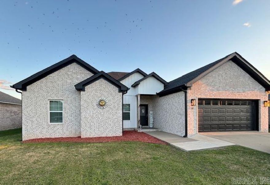 Beautiful well kept 2022 home. This 2150sqft home has 3 beds, an office/nursery/small den, 2 full baths, granite counter tops throughout, stainless steel appliances, large walk in pantry,  open floor plan, electric fireplace, luxury vinyl flooring in all areas, with carpet in primary bedroom. French doors that lead to patio and spacious yard. Primary bedroom has tray ceiling with accented wall and large bathroom and walk in closet. Second bedroom has walk in closet. Extra long garage with storm shelter, and fully fenced. All information deemed reliable, buyer and buyers agent to verify. Agents Please See Remarks.