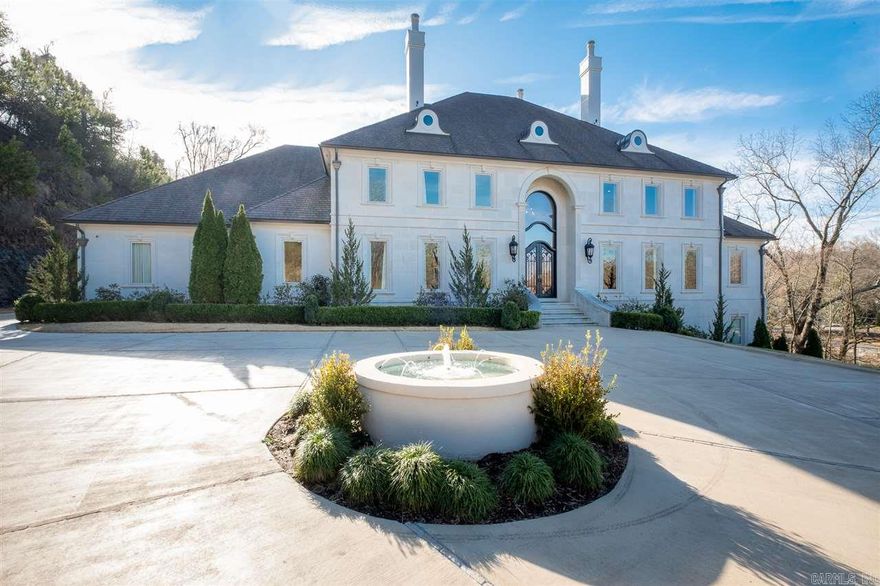 Rare 5.5 acre estate on Lakewood Lake. Precast stone, gated with 2 private docks. Salt water pool, waterfall, grotto,, outdoor kitchen and veranda for entertainment. Coffered ceiling library, site finished hardwoods, 2 laundry rooms, mud room, cozy hearth room and theater. Chef's kitchen, subzero, 2 Bosch dishwashers, Wolf 6 burner, Advantium oven, granite and island. Indoor basketball court, batting cage, safe room, wine cellar, sauna, gym and elevator.