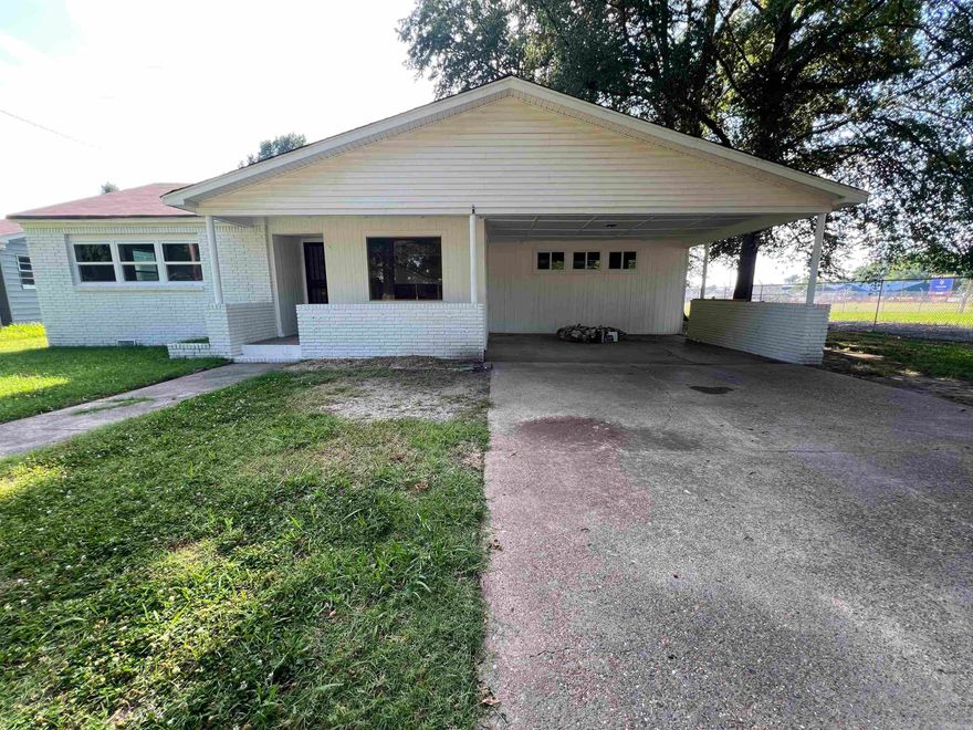 This recently remodeled home is centrally located in town and near the schools. This home offers 4 bedrooms and 2 full bathrooms.  The bonus room is highlighted by a beautiful new rock fireplace mantel.  Recent updates consist of: flooring, kitchen cabinets, countertops, bathtubs/showers, roof, windows (with the exception of the back room) fresh paint throughout the house and the exterior has recently been painted.  This home is move in ready with many modern up dates. Call today to schedule a showing.