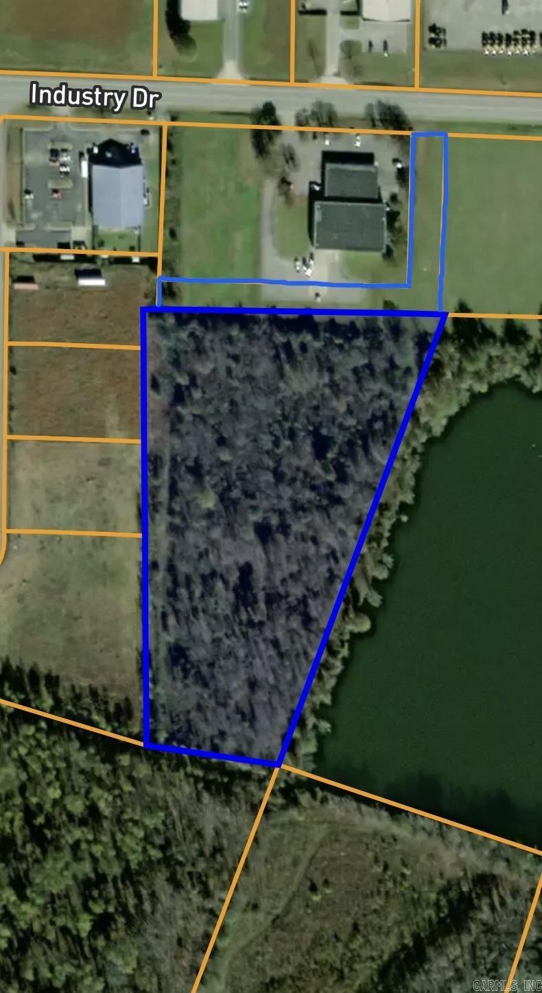 Great Property with a large lake to the left of the property. Zoned I-2. A very Unique Property. Land Only. Owner had property surveyed Feb. 2023.
