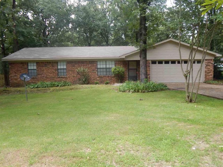 Totally updated!! NEW Granite in Kitchen and Bath! NEW Paint everywhere! NEW Hardwood LVP Floors throughout! New SS Stove, Microwave and DW!  NEW Fans and fixtures and outlets and light fixtures and blinds! Also, Nice SS Side by Side Fridge and Washer& Dryer! Over 1/2 acre nice level fenced yard! Workshop or storage off garage. NEW auto door opener! Newer roof and other features. Fireplace too! And in Bryant Schools! Available NOW! Can see anytime. Will consider a small pet. Sorry, No Housing or Section 8.