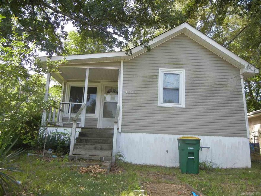 Fixer Upper. All offers must be presented with Buyer's acknowledgement that Seller has members who are AR Real Estate Brokers.  No mineral, gas, or oil rights are to be conveyed. Conveyance of the property shall be made to buyer by Special Warranty Deed. No offers accepted without earnest money!! Title insurance and survey are at buyer's expense. Property sold “As Is”, No disclosure available.