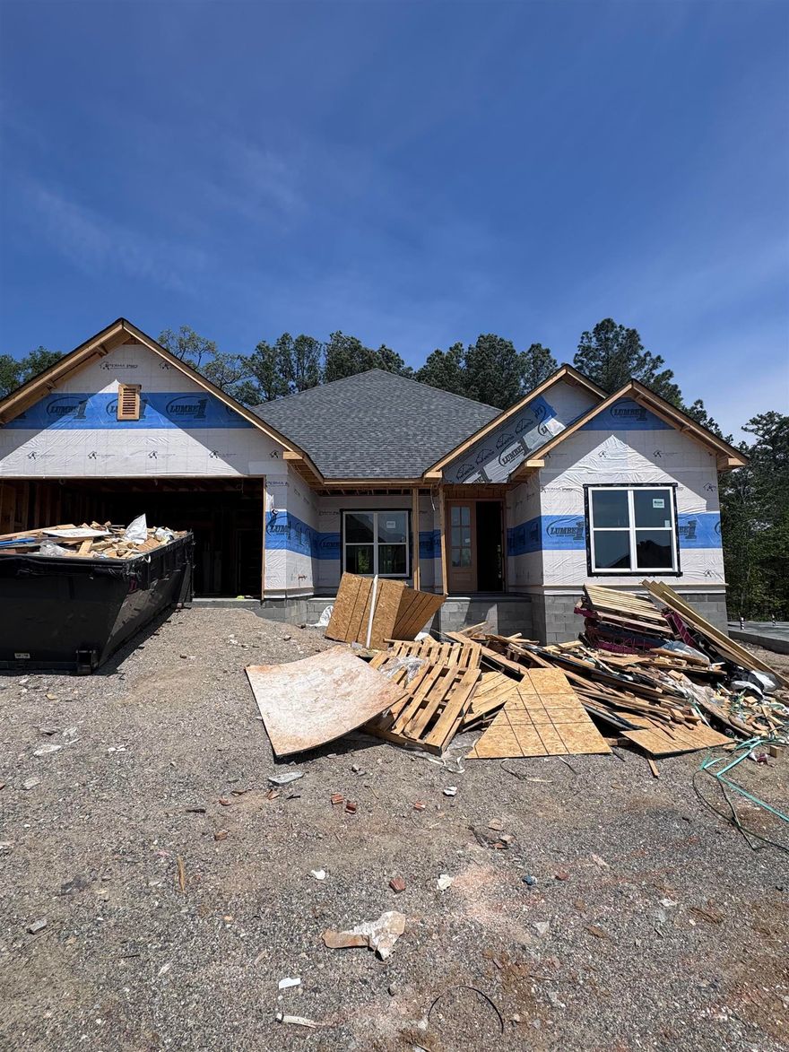 Take a look at this beautiful Craftsman-style home situated in a highly sought-after neighborhood in Bryant! You'll find custom designer touches throughout the residence, creating a perfect mix of elegance and functionality. Its excellent location also means you're just a short walk away from the neighborhood pool.  Picture yourself unwinding on the inviting front porch and taking advantage of the local weekend farmers market. This home boasts a thoughtfully designed layout with an open kitchen and living room filled with natural light, all while backing up to a secluded greenbelt.  Call listing agent to see it today.