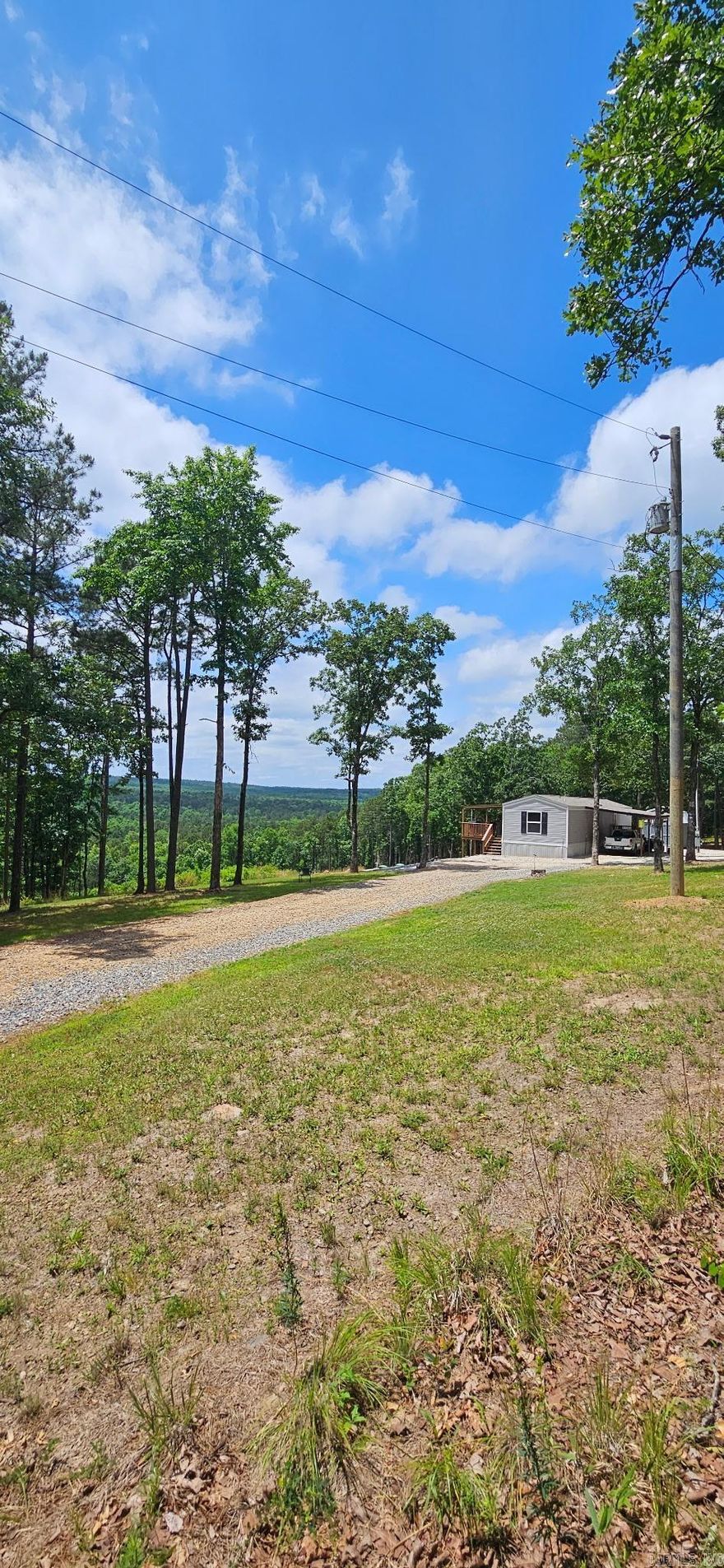 HUNTING!! AMAZING VIEW!! PRIVACY!!! This 15 acres is a dream come true!! End of the road privacy!! City water, fiber internet with 2 choices, trash pick up!! All the conveniences of the city but feels so remote! Only 25 minutes to Conway and West Little Rock, you are centered in between the two!  The land has walking paths right to your deer stand!! Build your dream home with a view as far as you can see!! This property is bordered on 3 sides by ARKANSAS GAME AND FISH LAND! You have your 15 acres and thousands of other acres at your access!! Mature Timber with dozens of huge White Oak, the Game and Fish Land is all timber as well! Deer and turkey in abundance on all the property watch the wildlife from your window or deck!!  Realtors see confidential remarks!! Professional photos and drone coming soon!!